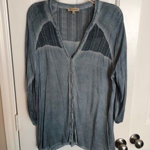 Blue top with shoulder details